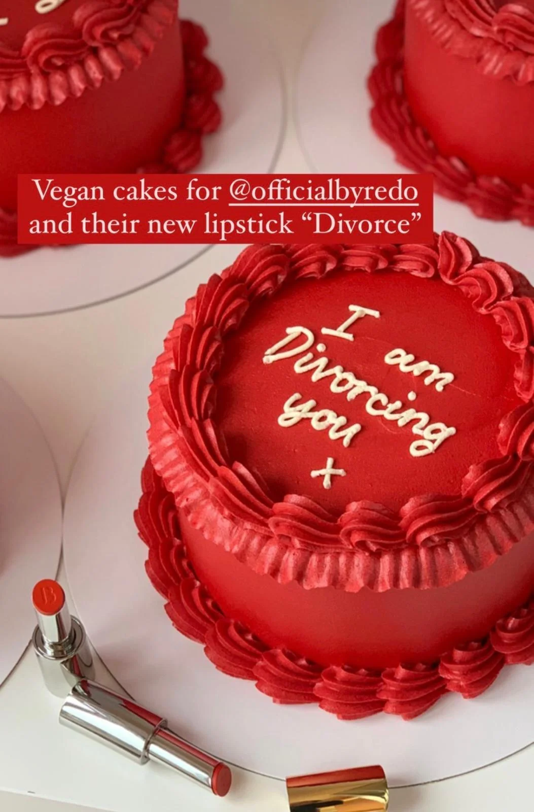 Red vegan cake piped with 'I am divorcing you', made for Byredo's Divorce lipstick launch